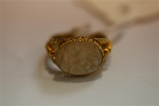 A 19th century two colour gold and oval cameo set ring, size F.